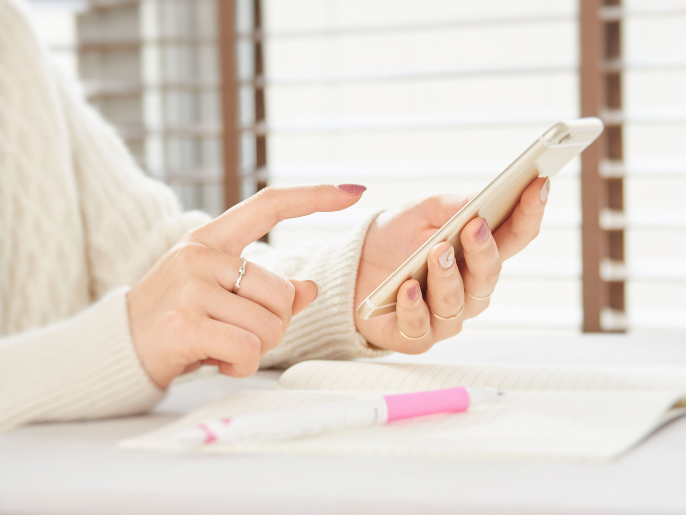 Woman operating a smartphone
